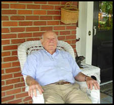 Jesse Grove on his famous Scottsville porch, 2005